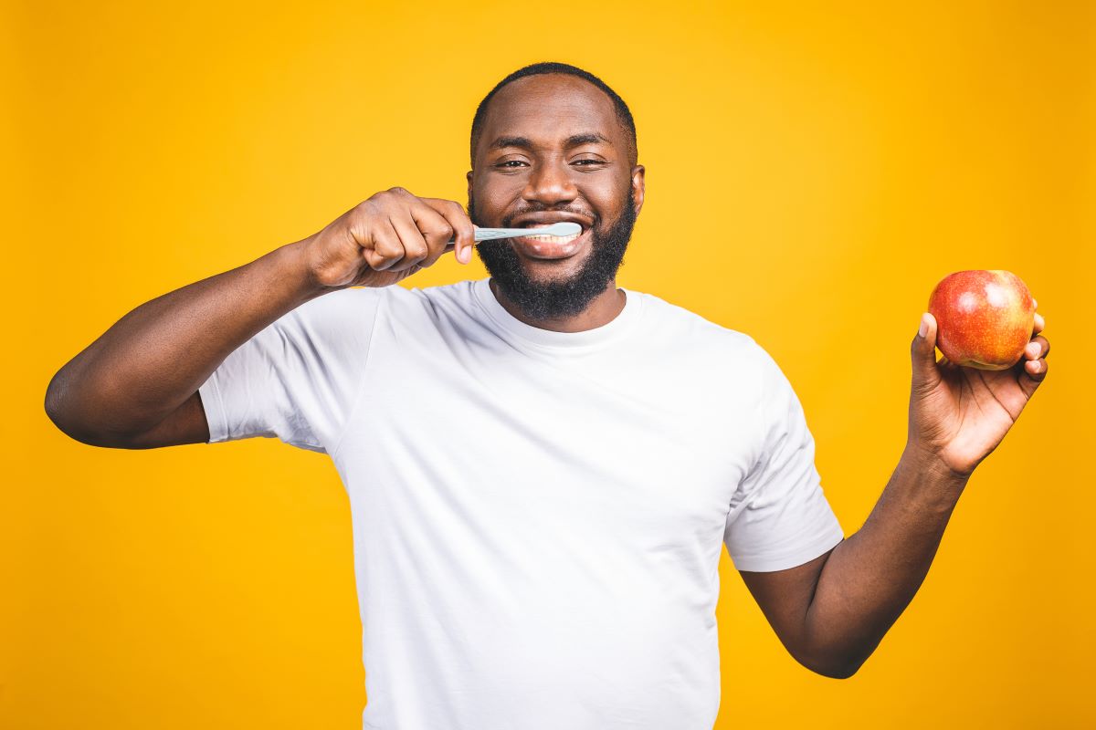 Man with a healthy smile practicing good oral health and nutrition in Lake Forest, California.